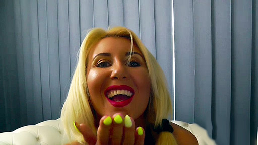  In this video, we have a stunningly beautiful blonde camgirl showing...